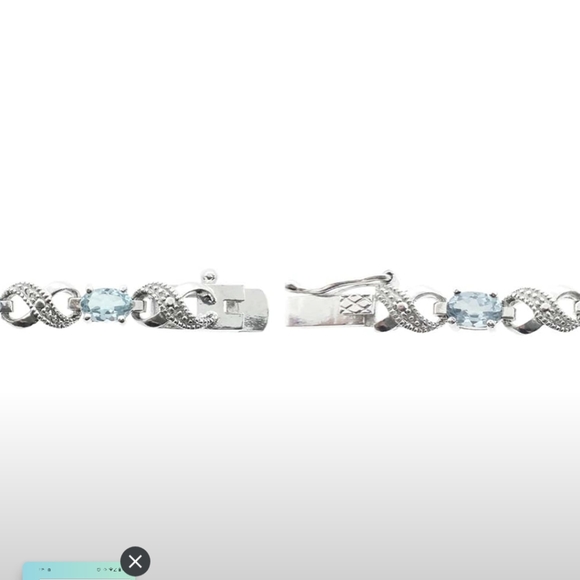 Blue Topaz and Diamond Accent Infinity Bracelet - Picture 2 of 9